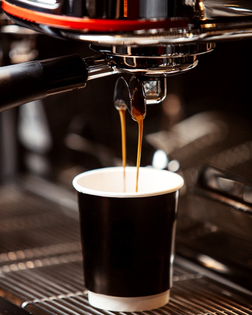 Close-up of a modern coffee maker ready to brew fresh coffee.
