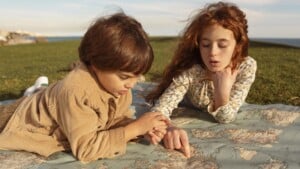 medium shot kids looking map